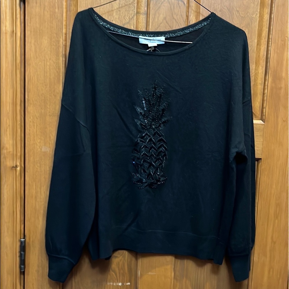 A new beautiful warm Tommy Bahama black top.